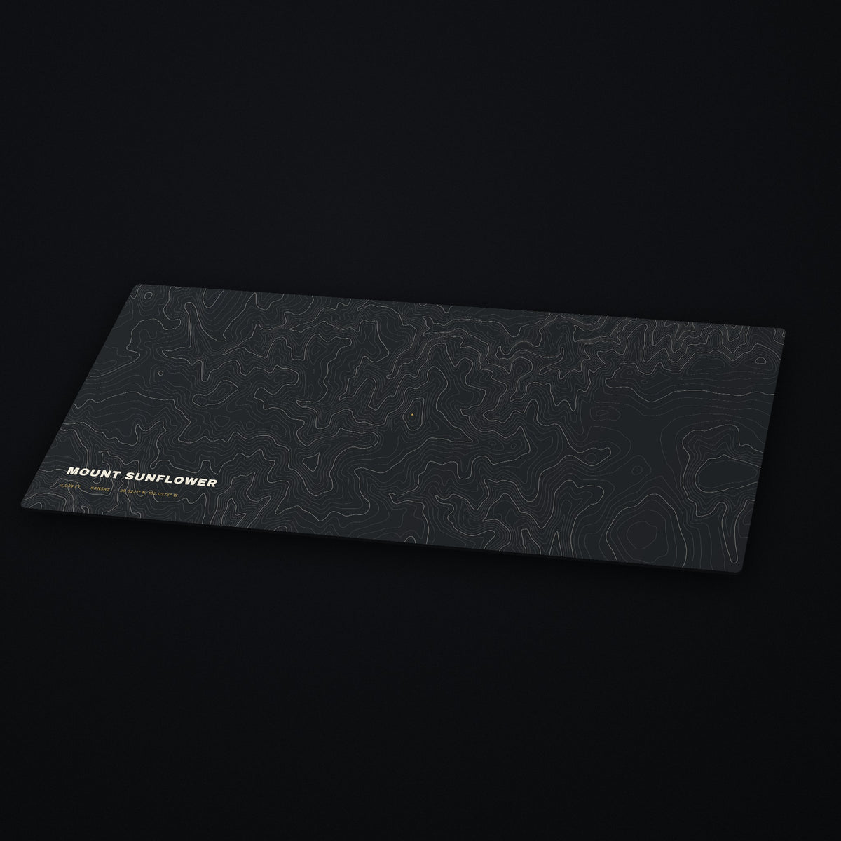 Mount Sunflower Topo Desk Mat at an angle on a dark desk