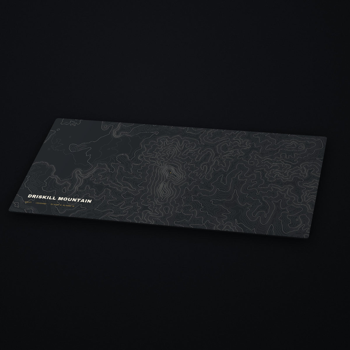 Driskill Mountain Topo Desk Mat at an angle on a dark desk