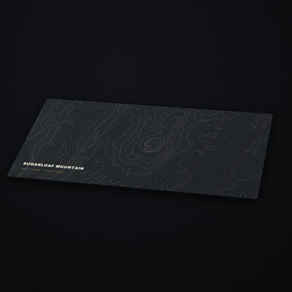 Sugarloaf Mountain Topo Desk Mat at an angle on a dark desk