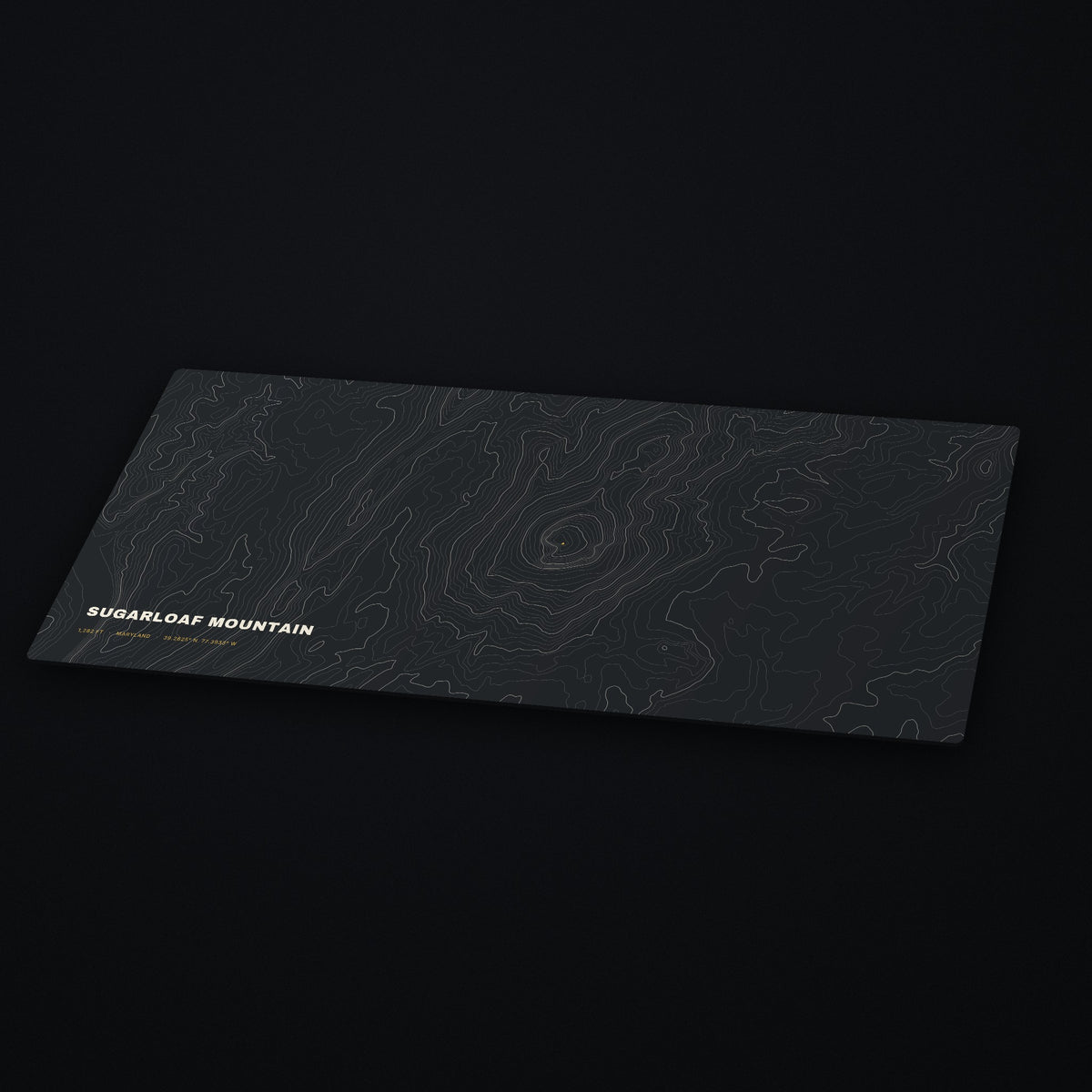 Sugarloaf Mountain Topo Desk Mat at an angle on a dark desk