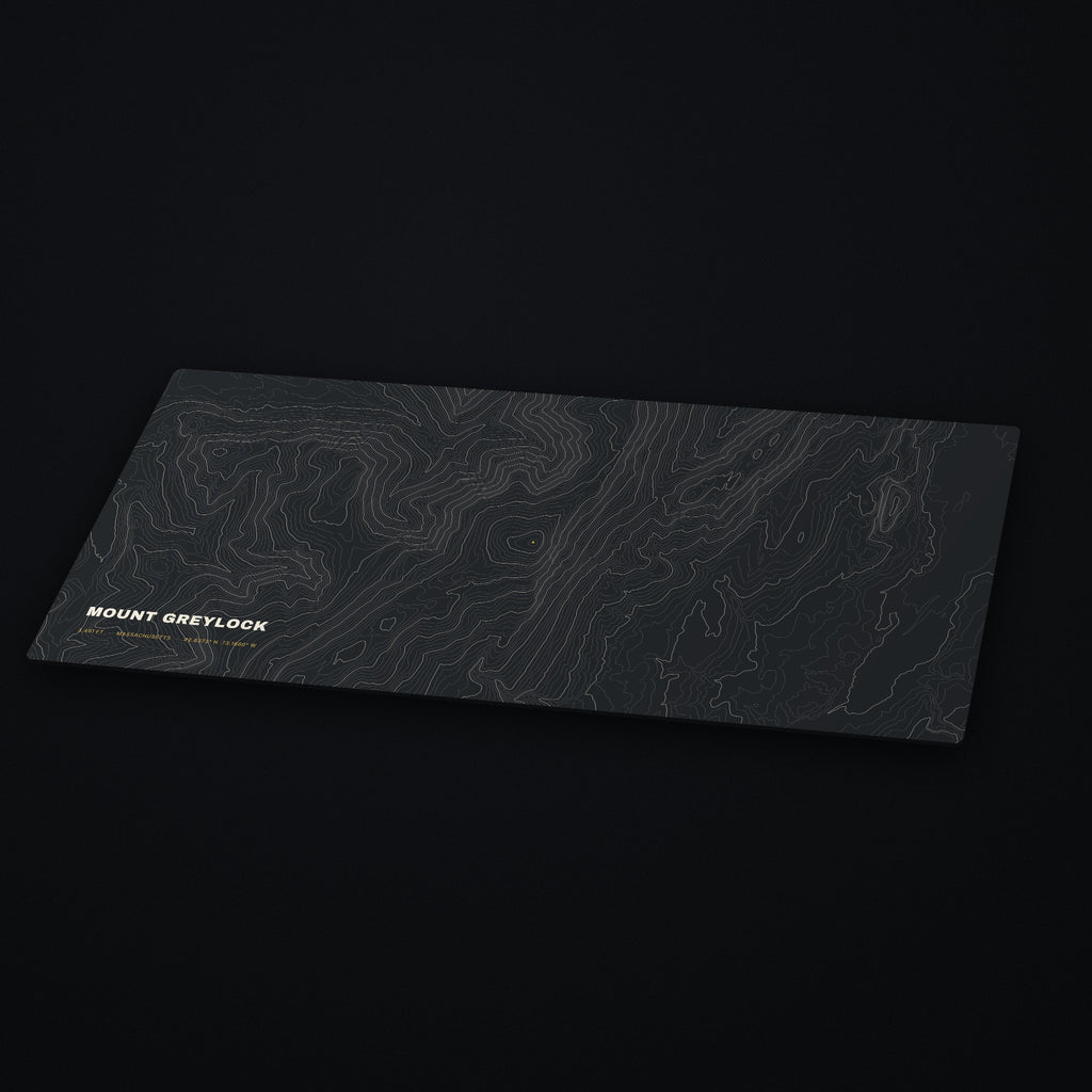 Mount Greylock Topo Desk Mat at an angle on a dark desk