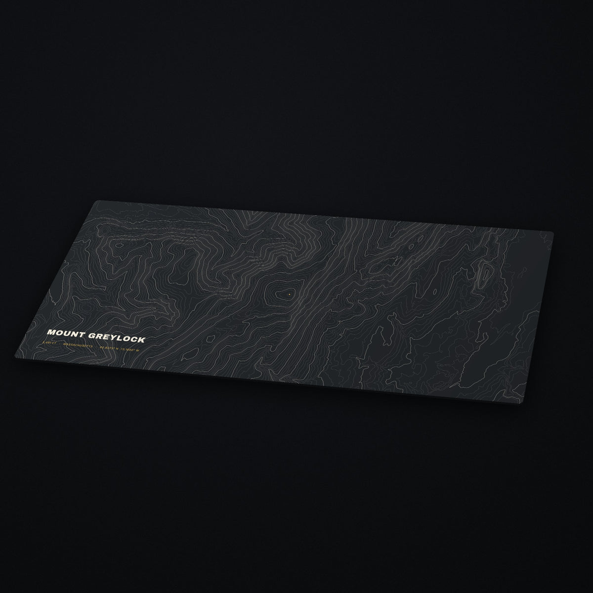 Mount Greylock Topo Desk Mat at an angle on a dark desk