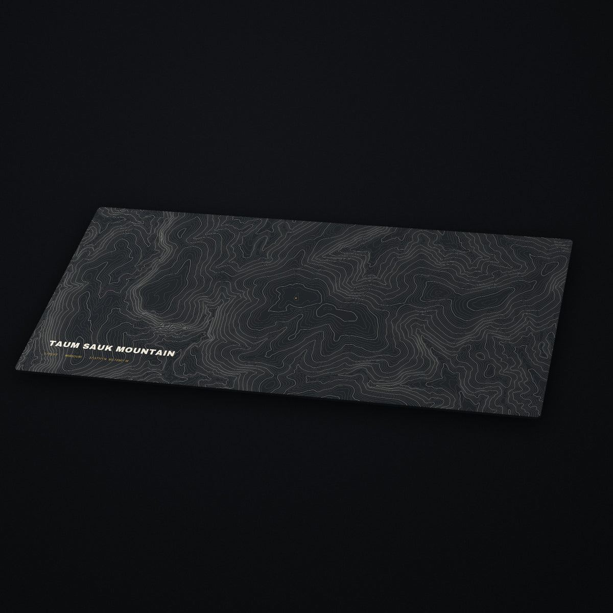 Taum Sauk Mountain Topo Desk Mat at an angle on a dark desk