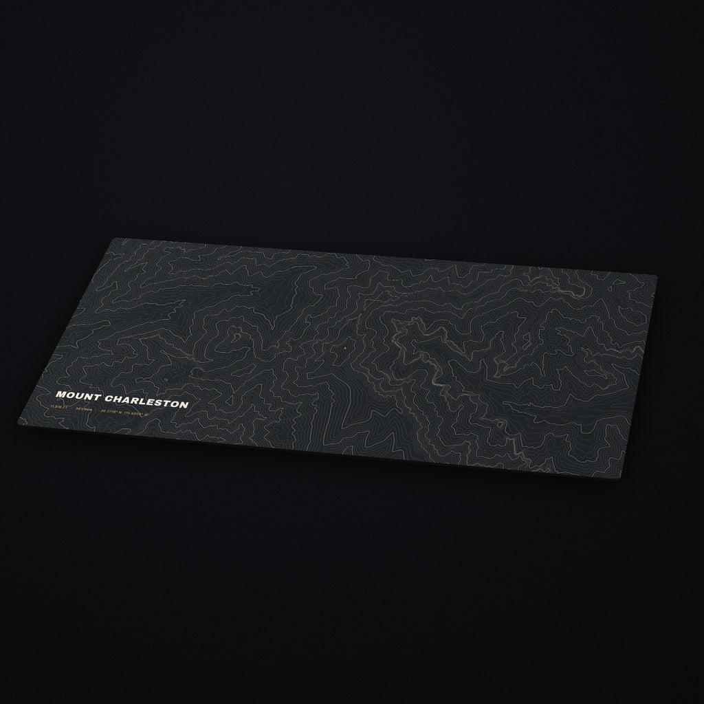 Mount Charleston Topo Desk Mat at an angle on a dark desk