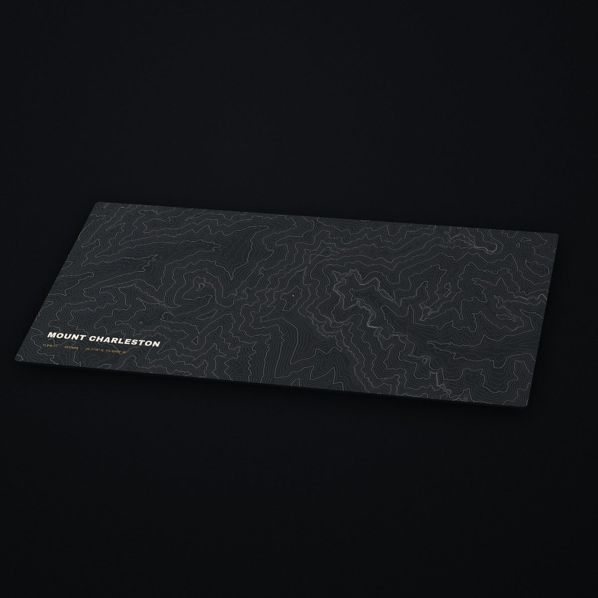 Mount Charleston Topo Desk Mat at an angle on a dark desk