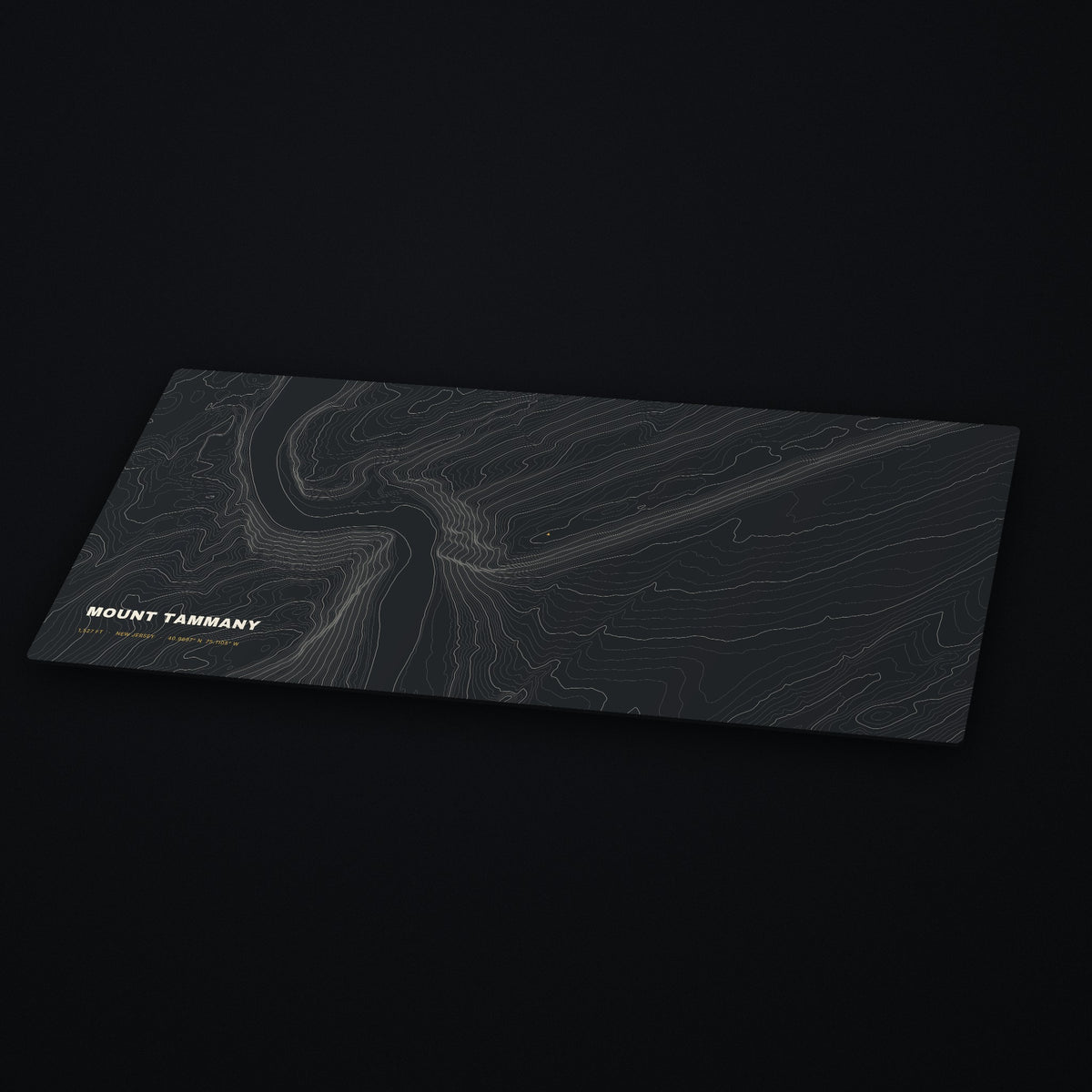 Mount Tammany Topo Desk Mat at an angle on a dark desk
