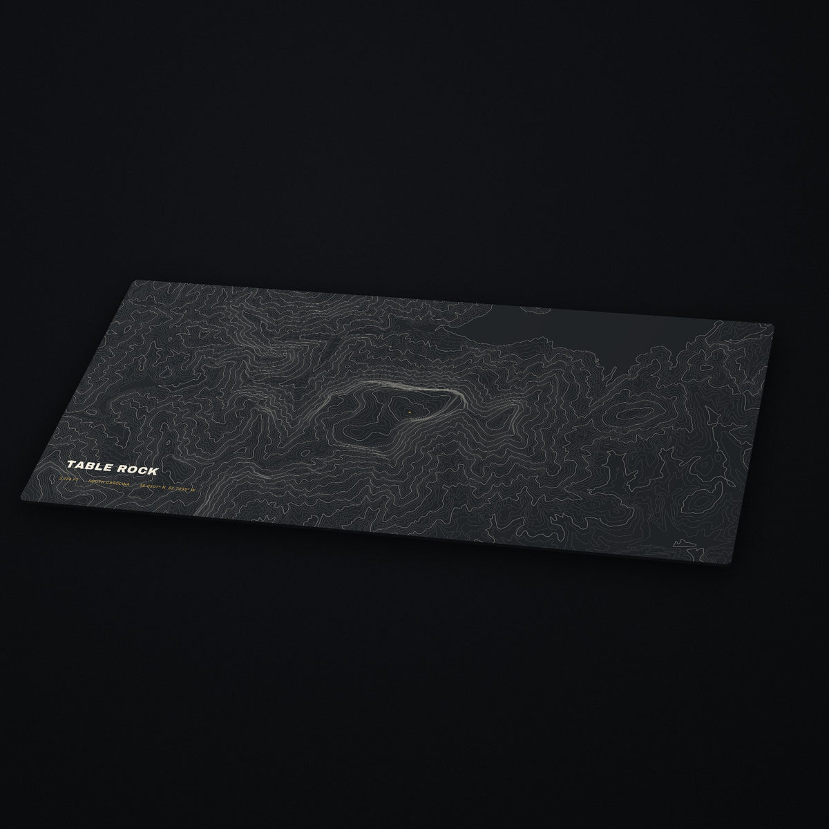 Table Rock Topo Desk Mat at an angle on a dark desk