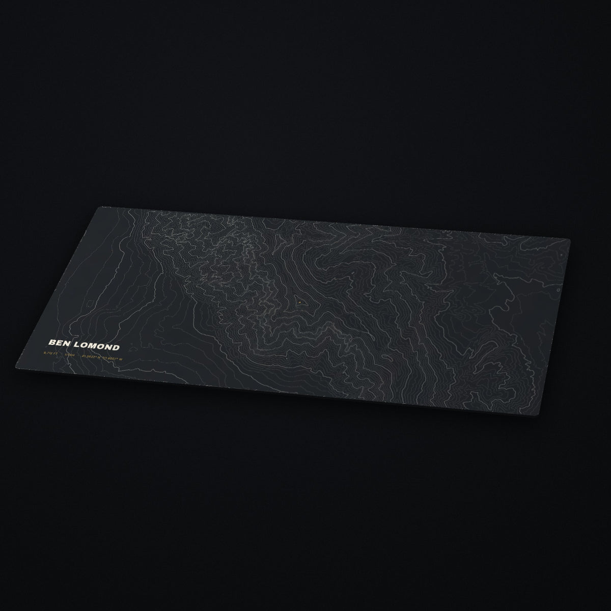 Ben Lomond Topo Desk Mat at an angle on a dark desk