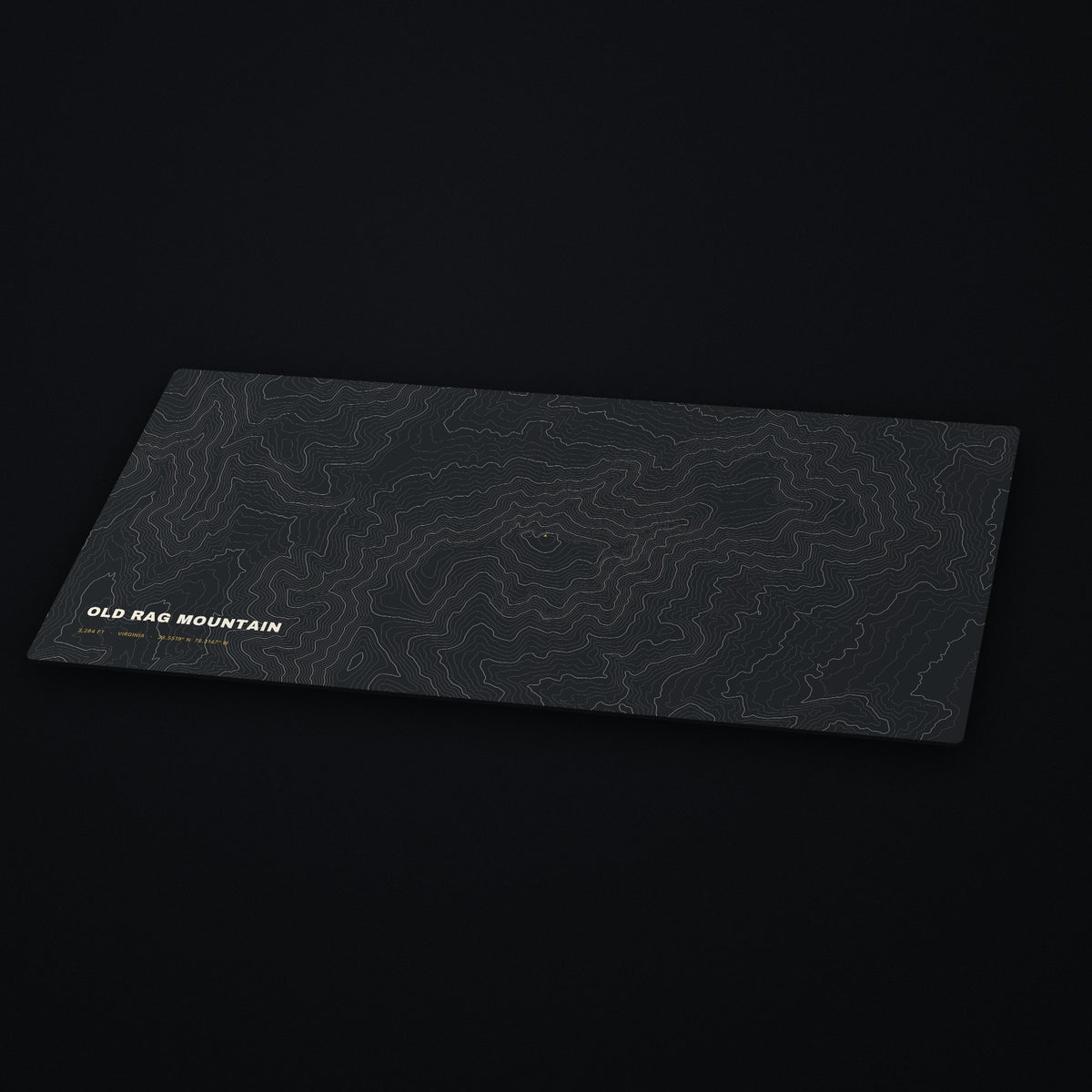 Old Rag Mountain Topo Desk Mat at an angle on a dark desk