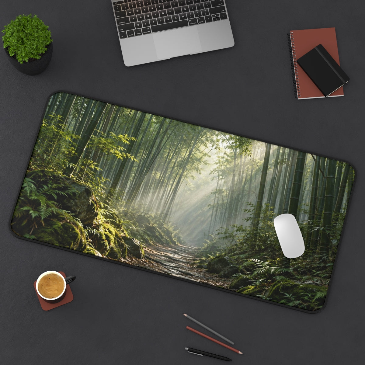 Bamboo Light desk mat on a desk with a laptop, mouse and coffee cup for scale