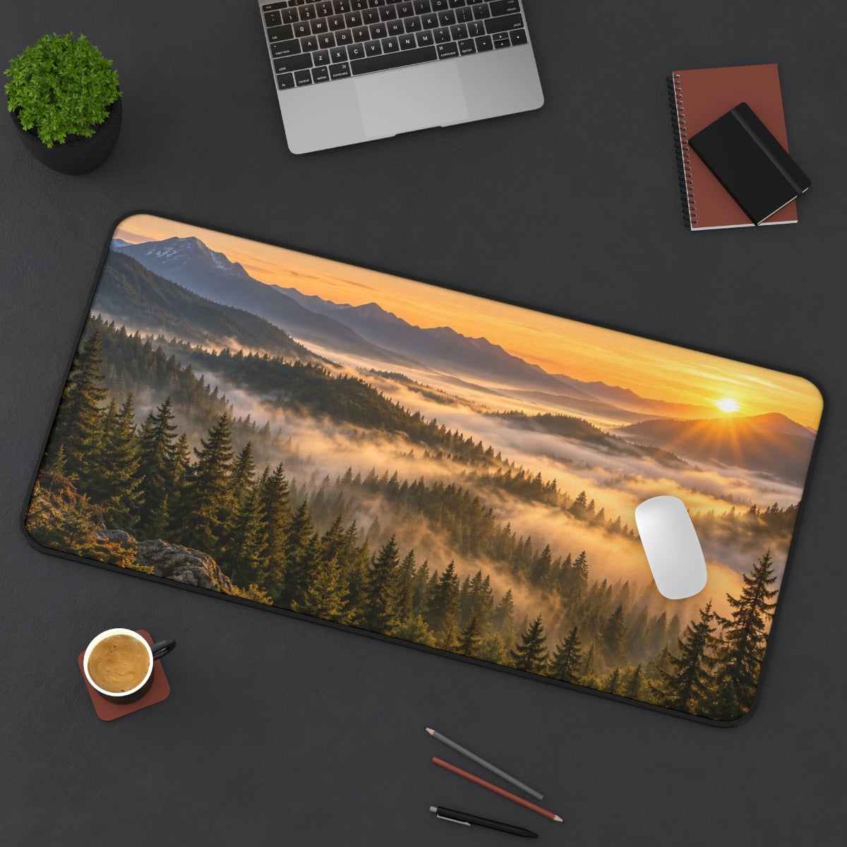 Fog Valley desk mat on a desk with a laptop, mouse and coffee cup for scale