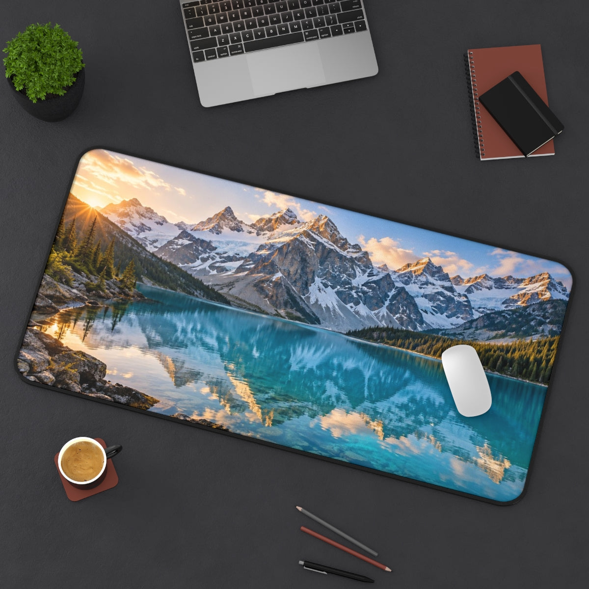 Glacier Lake desk mat on a desk with a laptop, mouse and coffee cup for scale