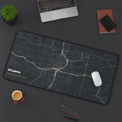Atlanta Street Map desk mat on a desk with a laptop, mouse and coffee cup for scale