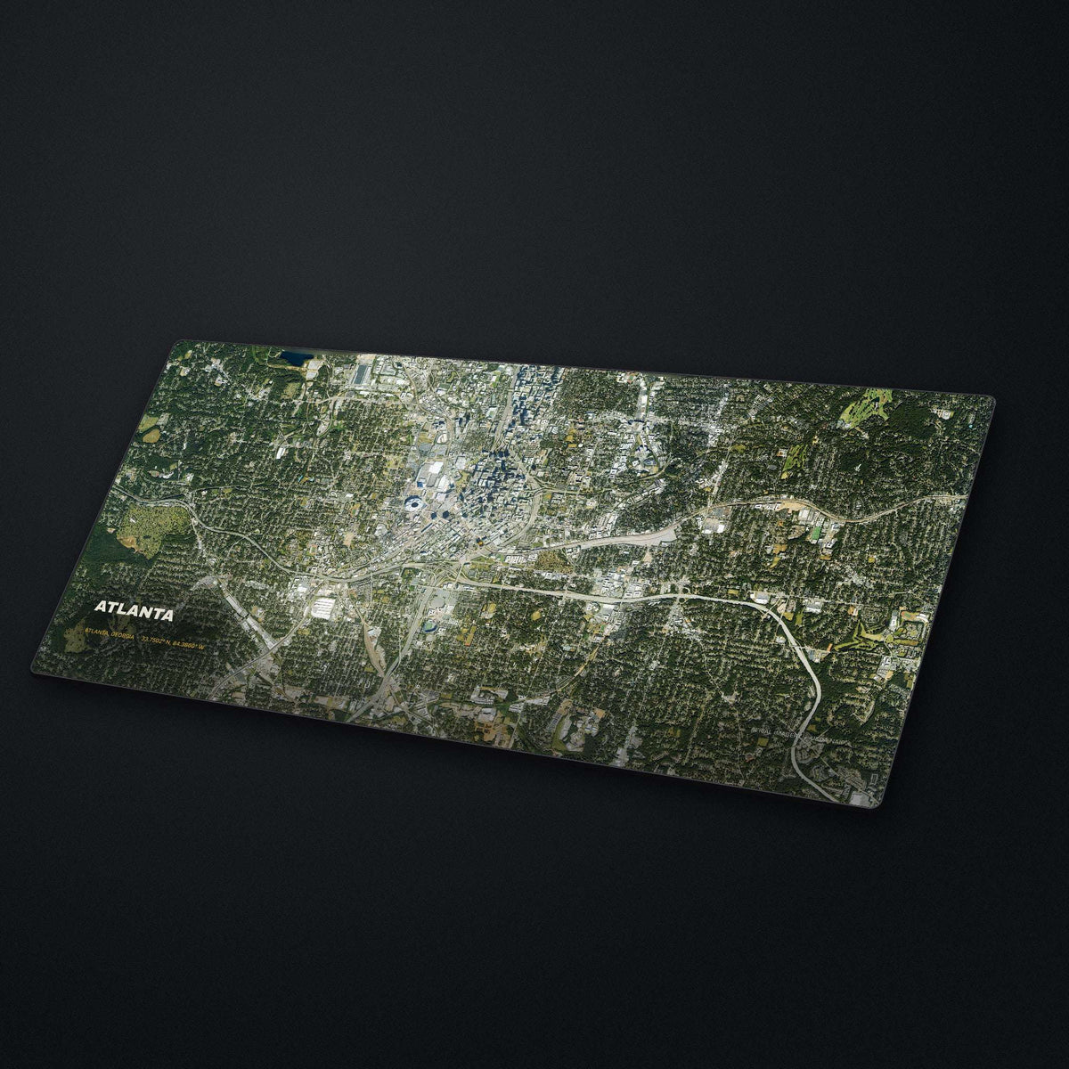 Atlanta Satellite Desk Mat at an angle on a stone desk