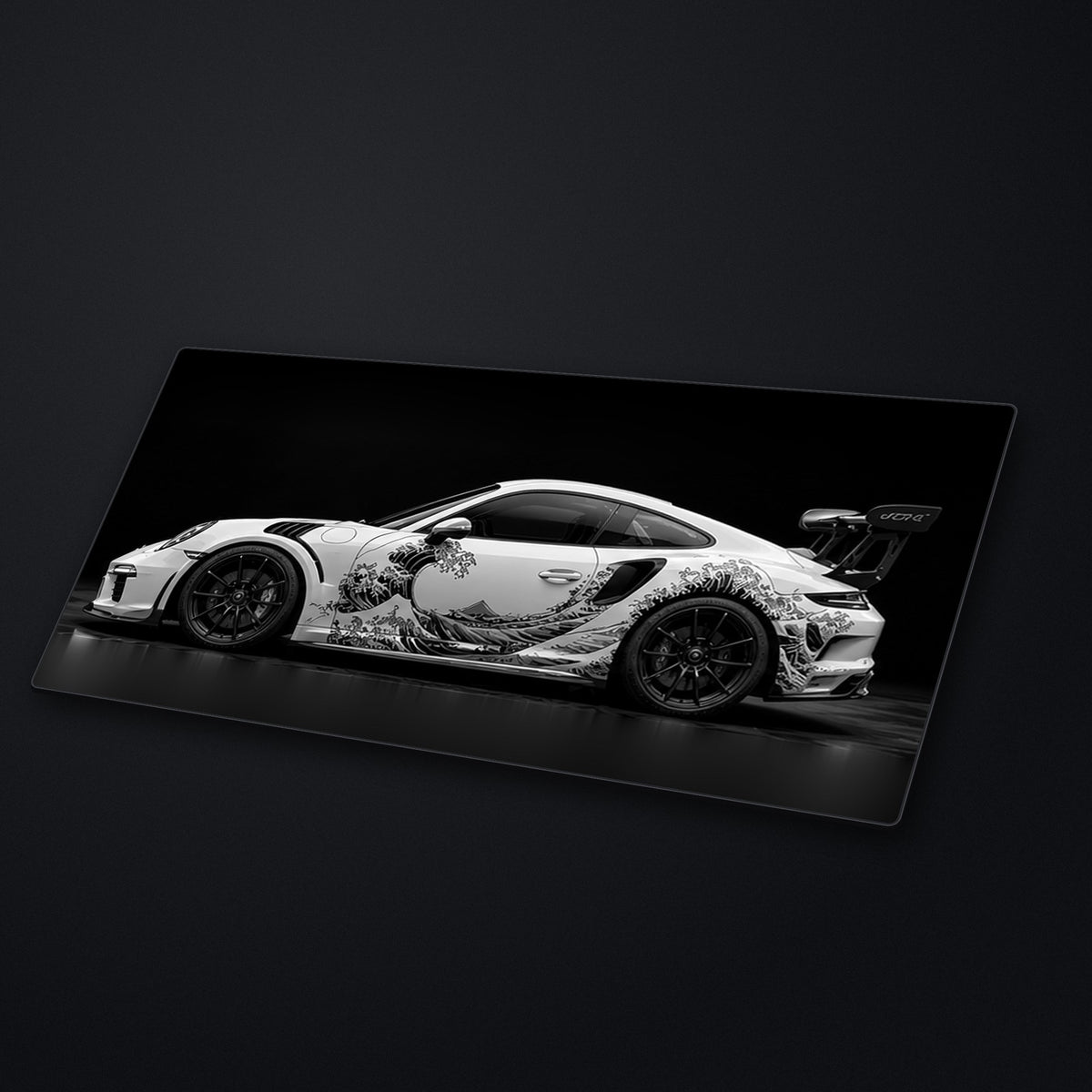 Black White Wave Desk Mat at an angle on a stone desk