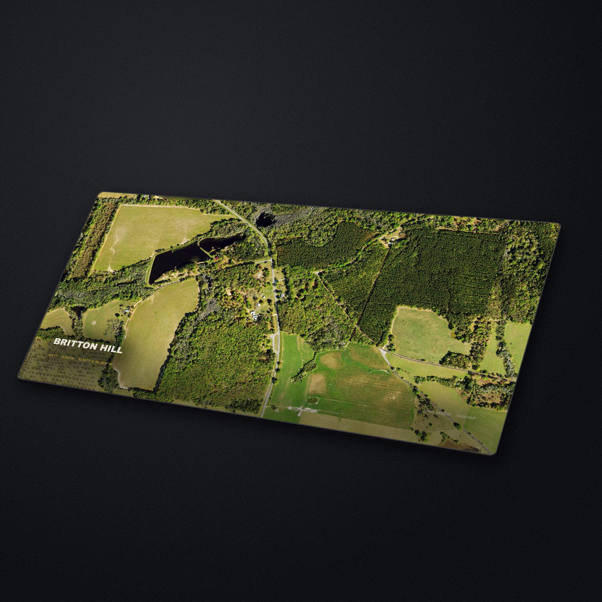 Britton Hill Satellite Desk Mat at an angle on a stone desk