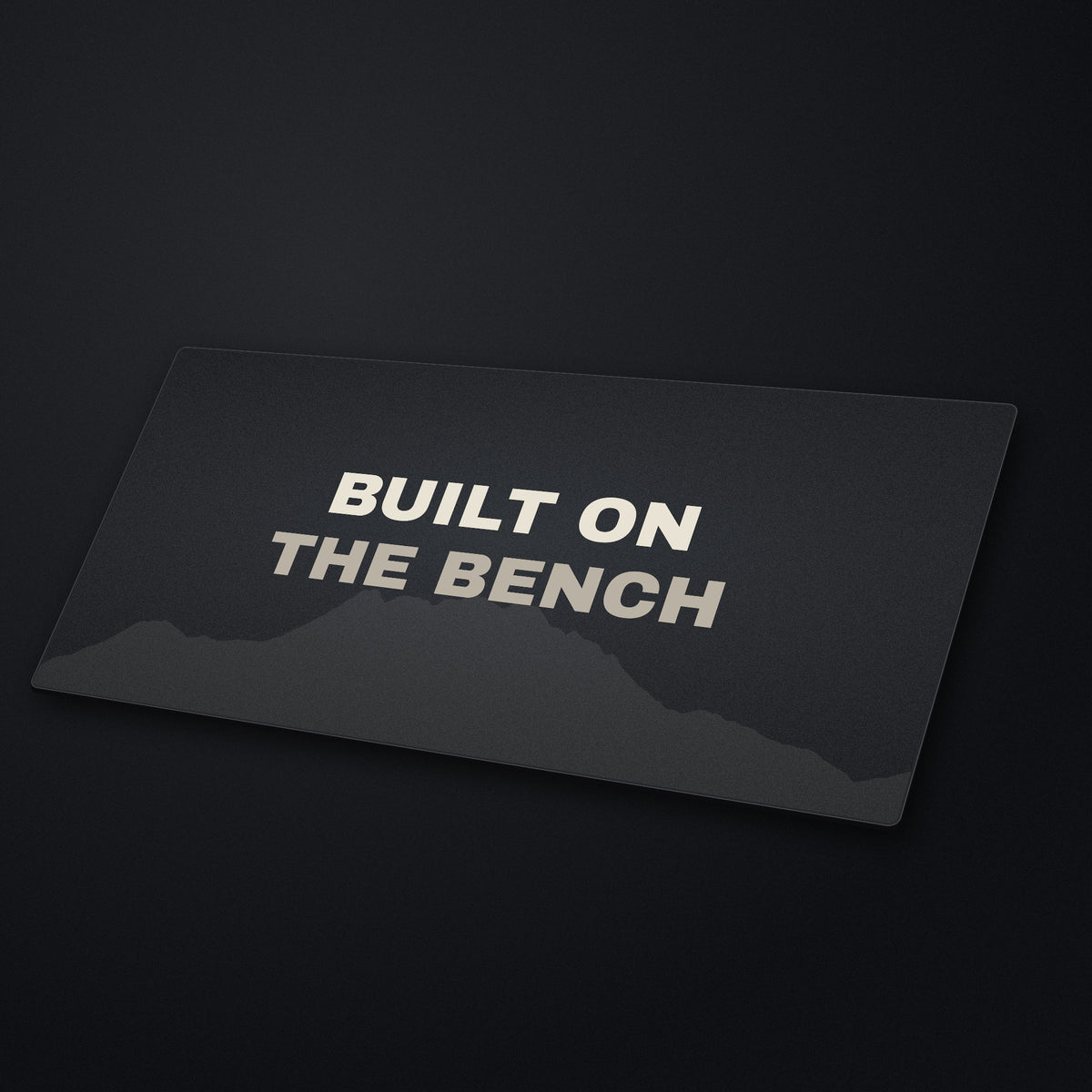 Built on the Bench Desk Mat at an angle on a stone desk