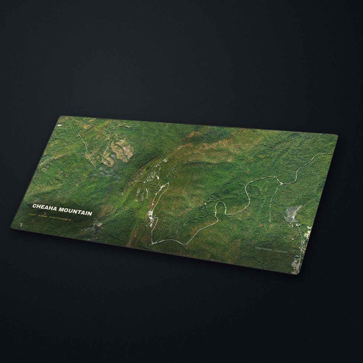 Cheaha Mountain Satellite Desk Mat at an angle on a stone desk