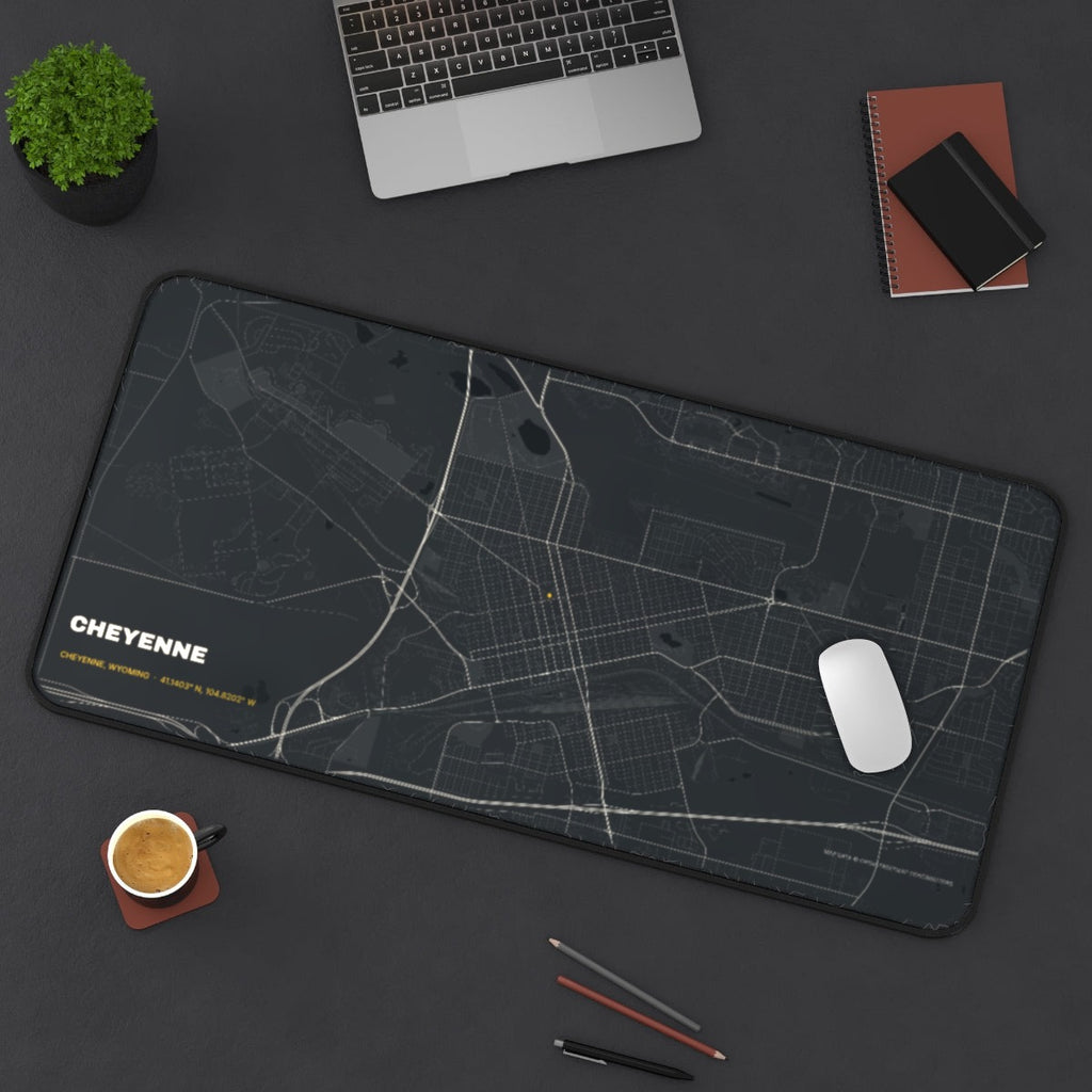 Cheyenne Street Map desk mat on a desk with a laptop, mouse and coffee cup for scale