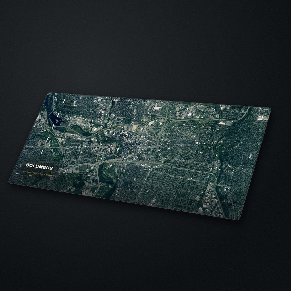 Columbus Satellite Desk Mat at an angle on a stone desk
