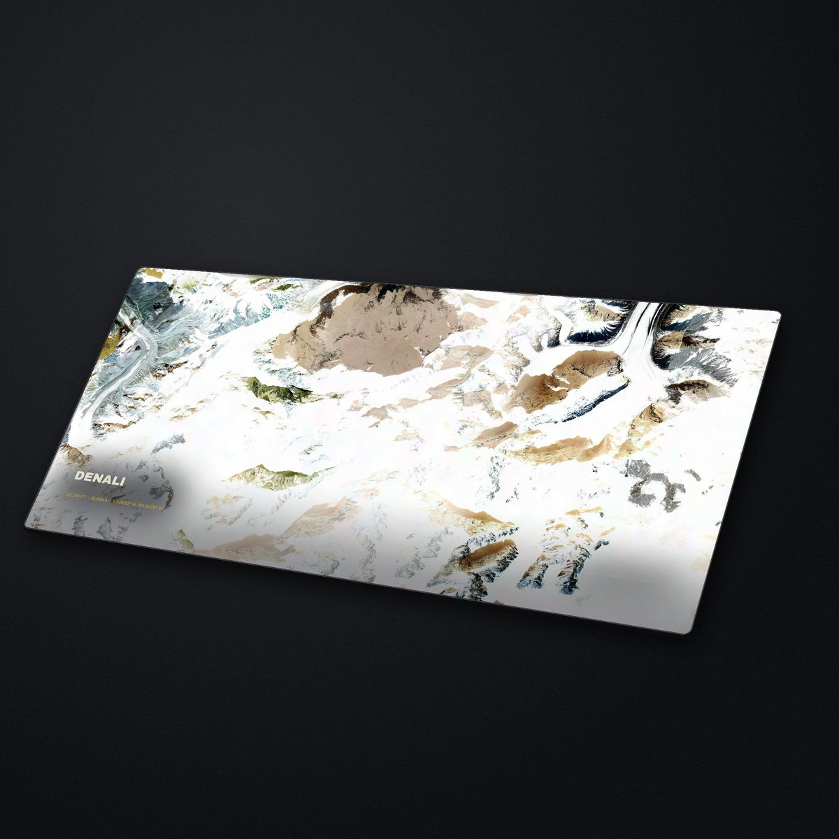 Denali Satellite Desk Mat at an angle on a stone desk