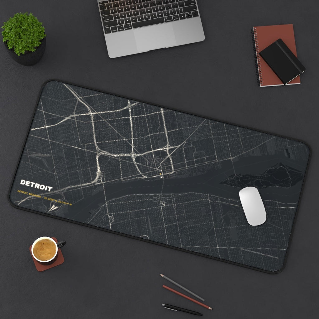 Detroit Street Map desk mat on a desk with a laptop, mouse and coffee cup for scale