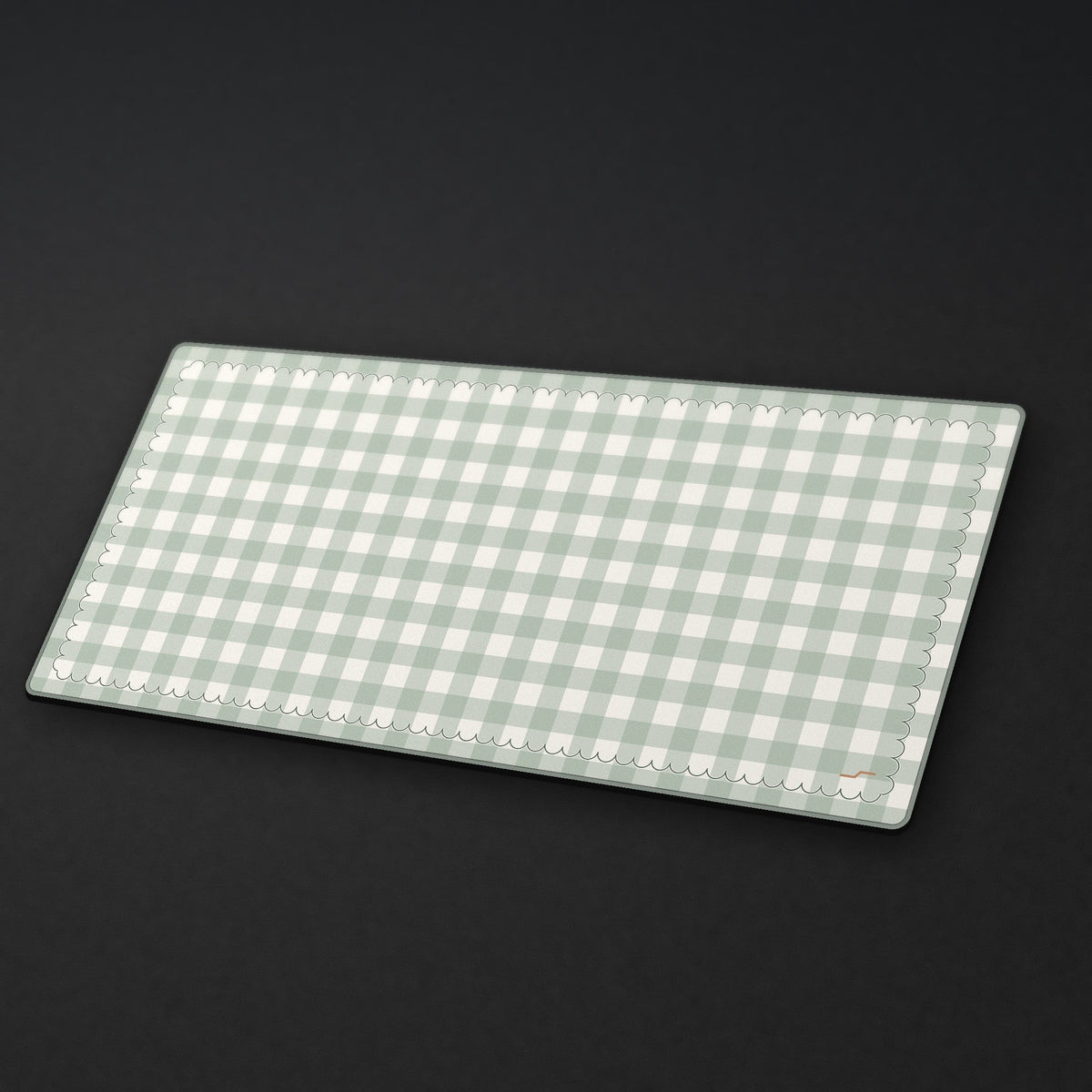 Sage Gingham Desk Mat at an angle on a stone desk