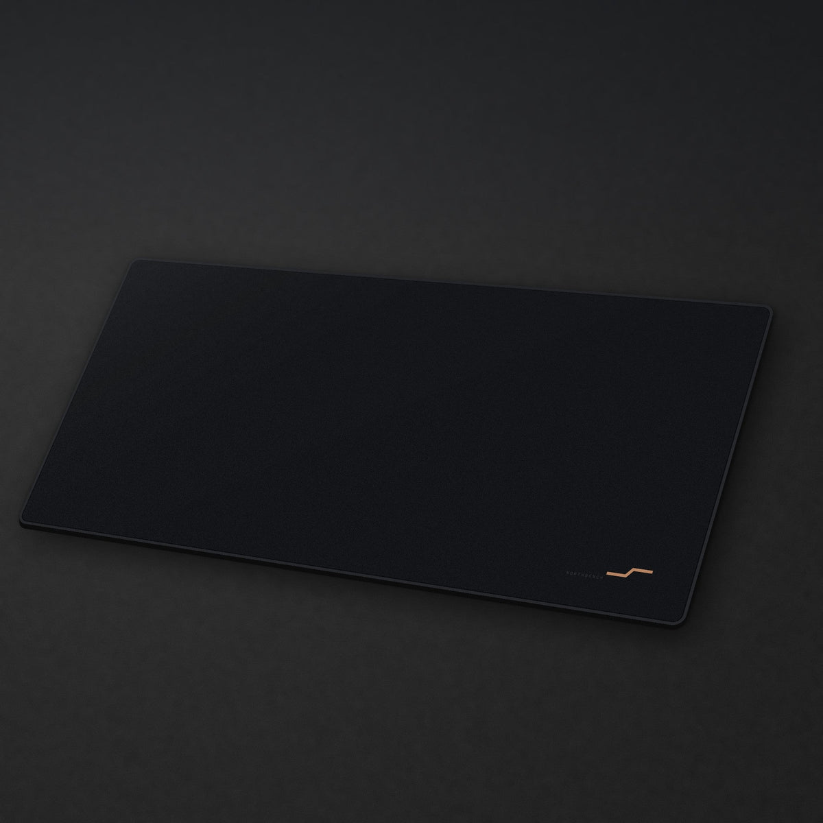 Granite Desk Mat at an angle on a stone desk