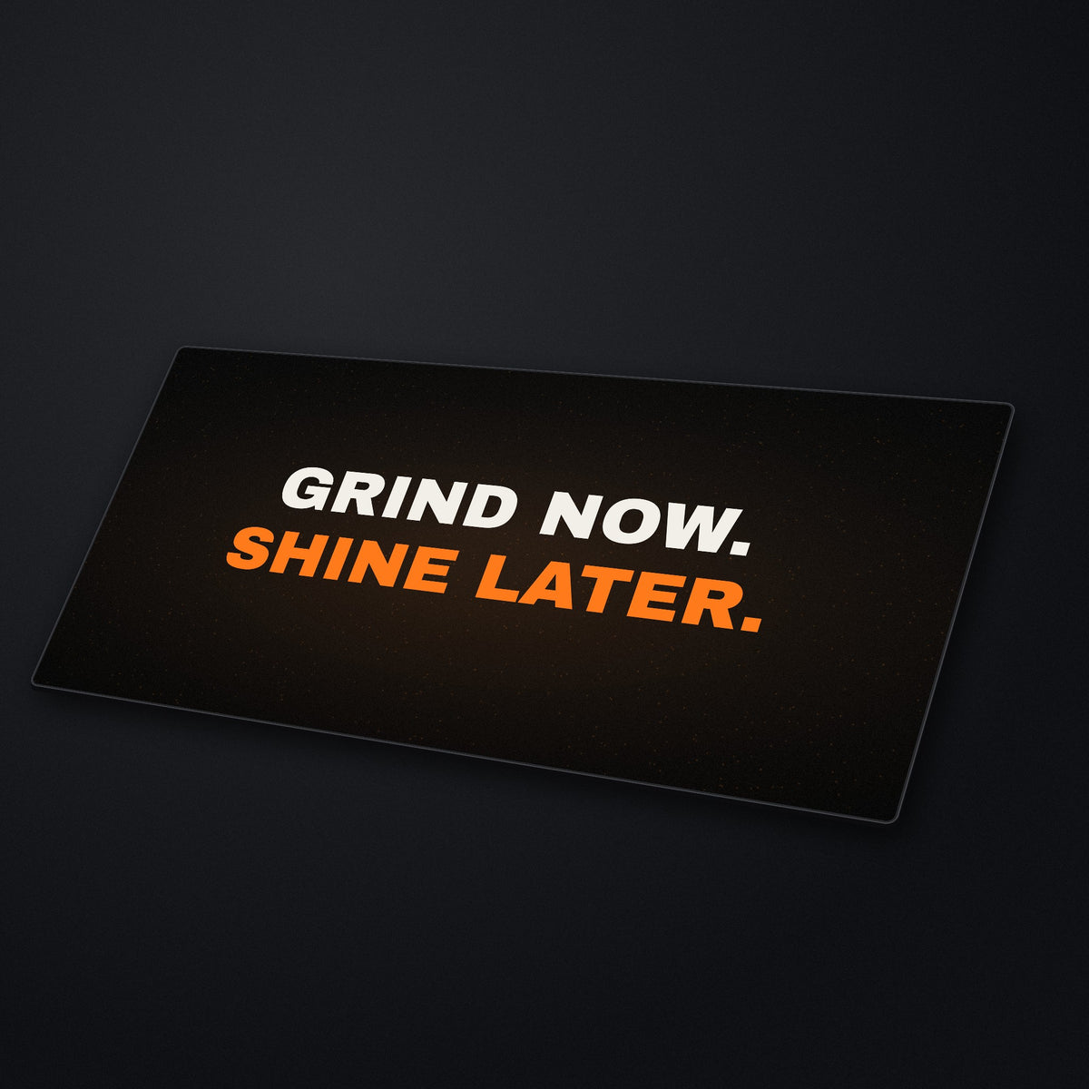 Grind Now Shine Later Desk Mat at an angle on a stone desk