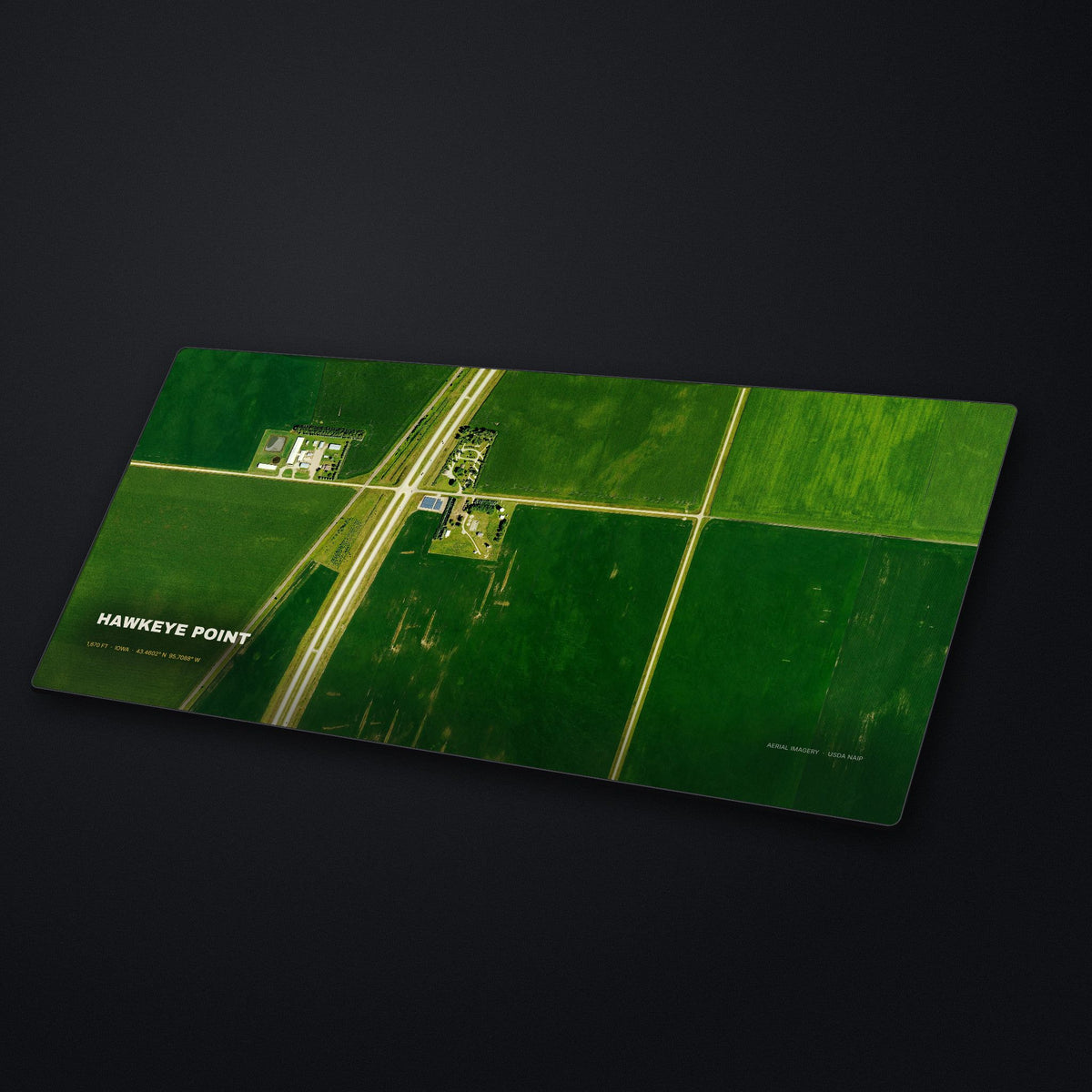 Hawkeye Point Satellite Desk Mat at an angle on a stone desk