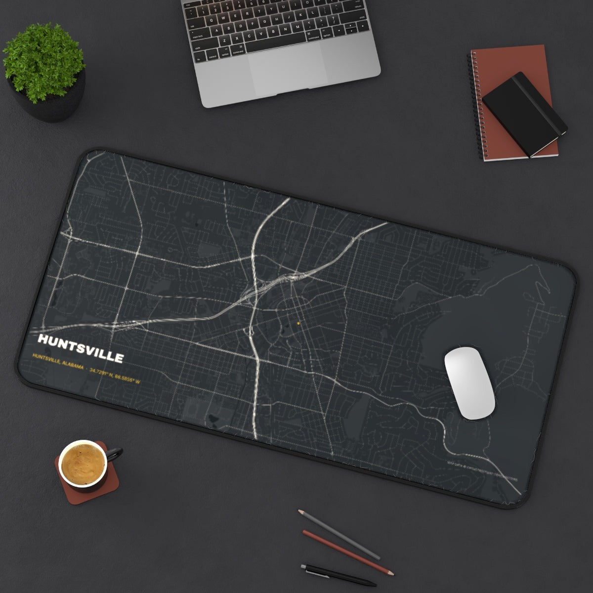 Huntsville Street Map desk mat on a desk with a laptop, mouse and coffee cup for scale