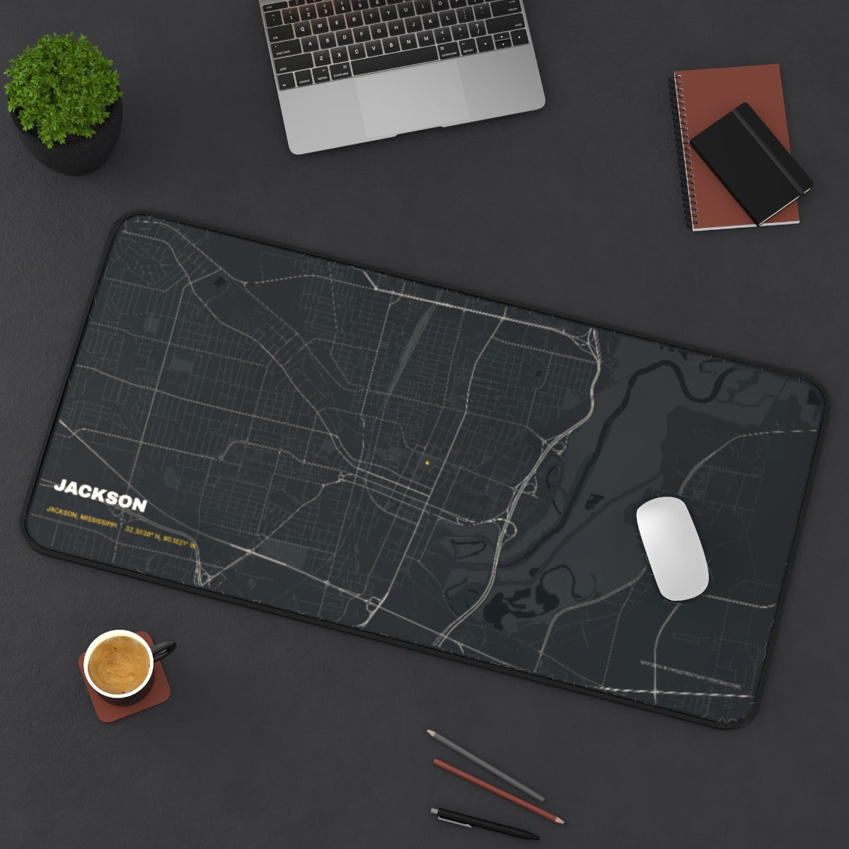 Jackson Street Map desk mat on a desk with a laptop, mouse and coffee cup for scale
