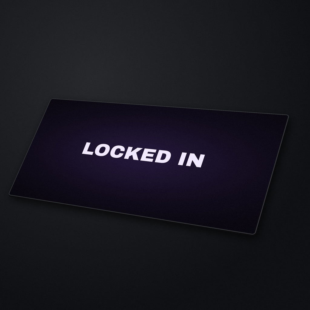Locked In Desk Mat at an angle on a stone desk
