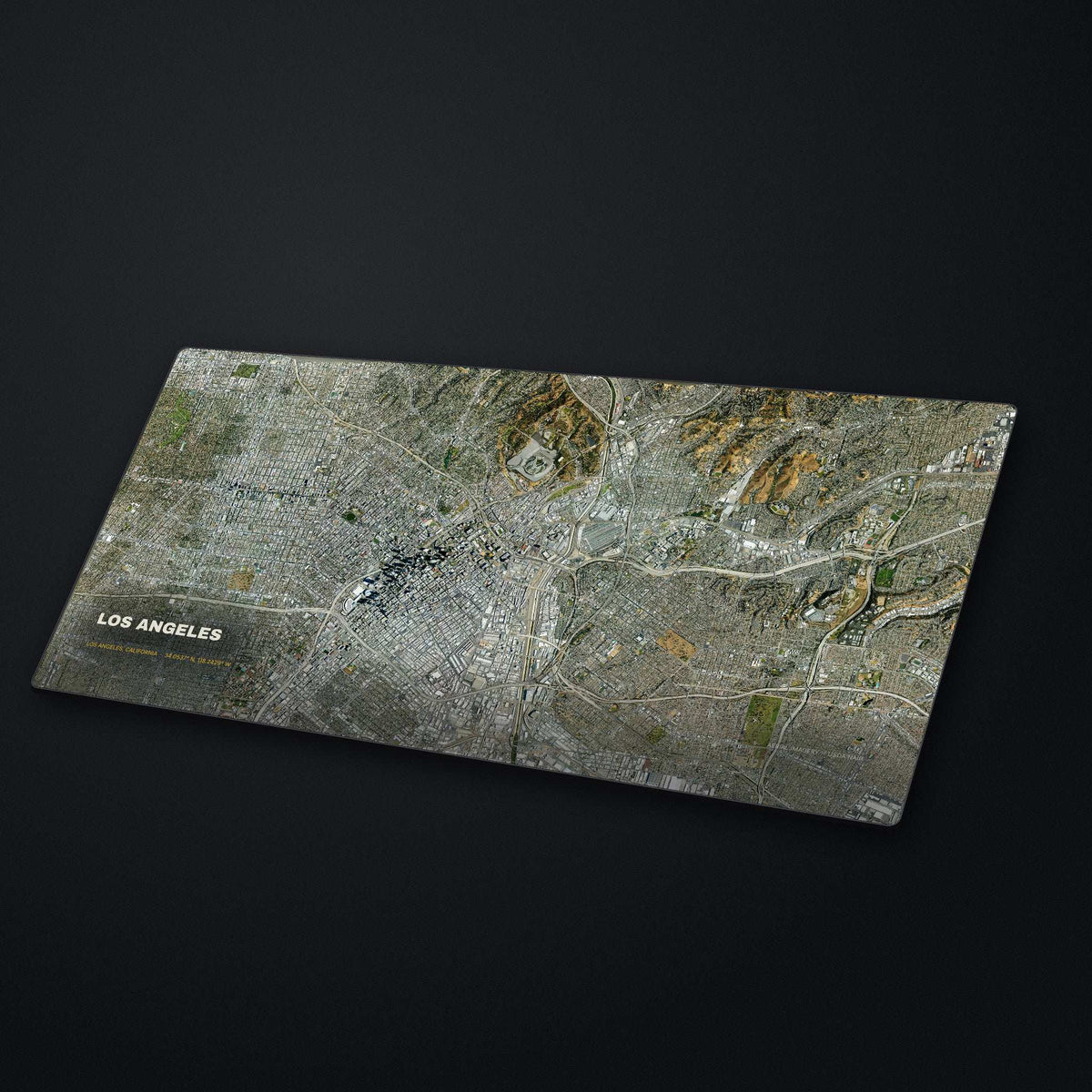 Los Angeles Satellite Desk Mat at an angle on a stone desk