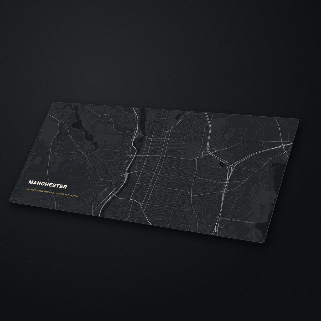 Manchester Street Map Desk Mat at an angle on a stone desk