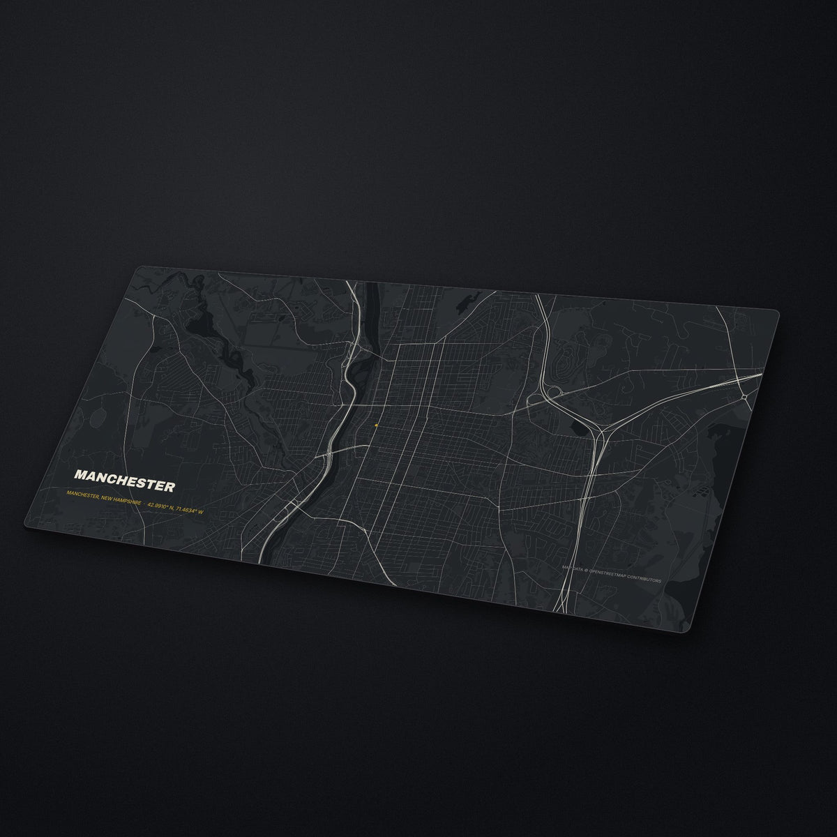 Manchester Street Map Desk Mat at an angle on a stone desk