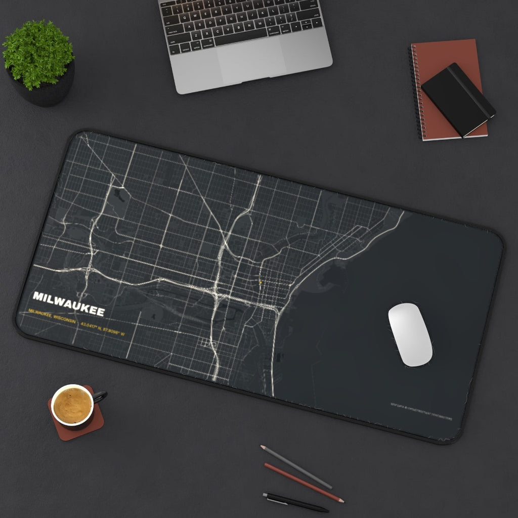 Milwaukee Street Map desk mat on a desk with a laptop, mouse and coffee cup for scale