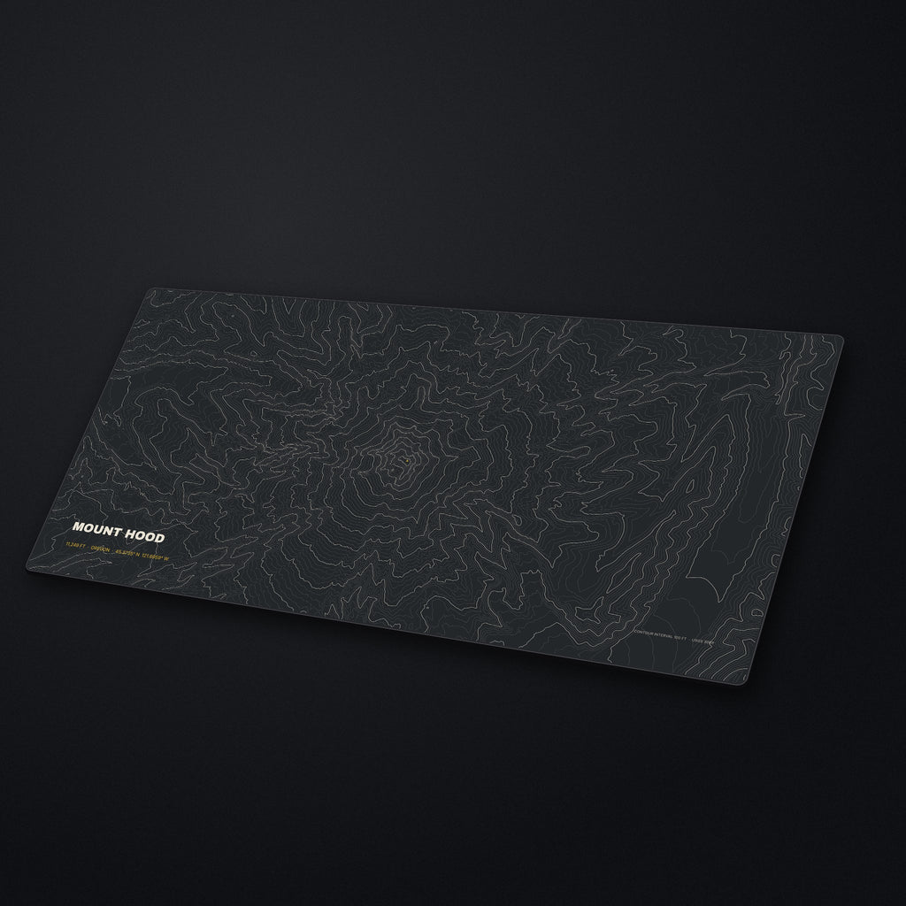 Mount Hood Topo Desk Mat at an angle on a stone desk