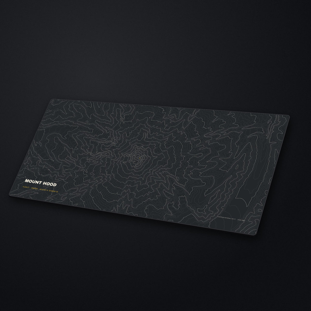 Mount Hood Topo Desk Mat at an angle on a stone desk