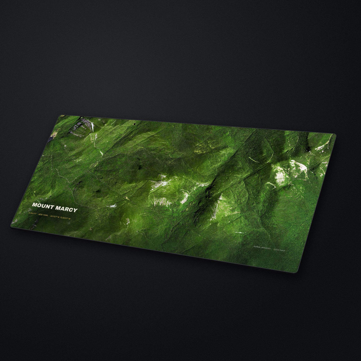 Mount Marcy Satellite Desk Mat at an angle on a stone desk