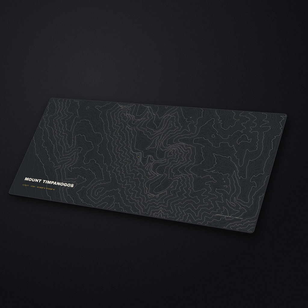Mount Timpanogos Topo Desk Mat at an angle on a stone desk