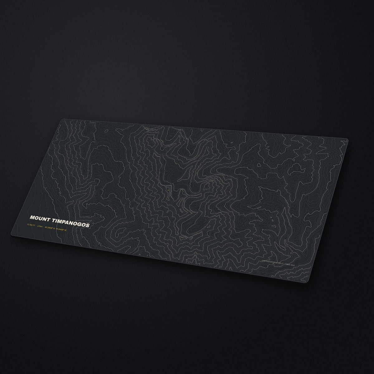 Mount Timpanogos Topo Desk Mat at an angle on a stone desk