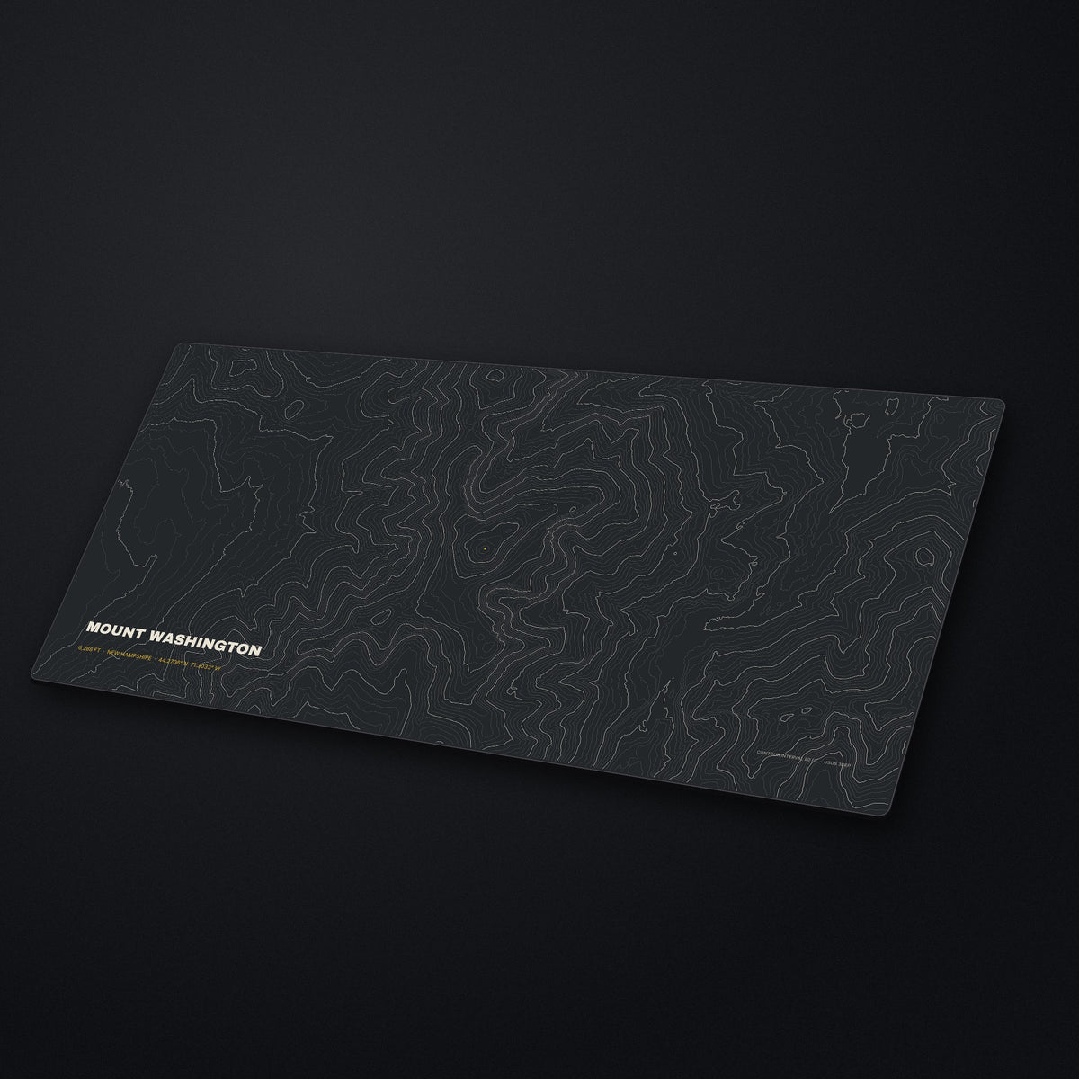 Mount Washington Topo Desk Mat at an angle on a stone desk