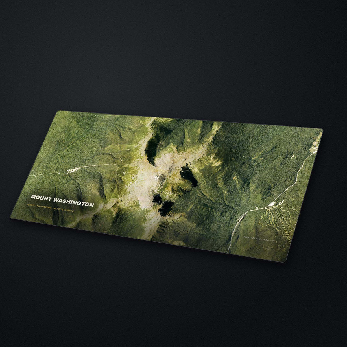 Mount Washington Satellite Desk Mat at an angle on a stone desk