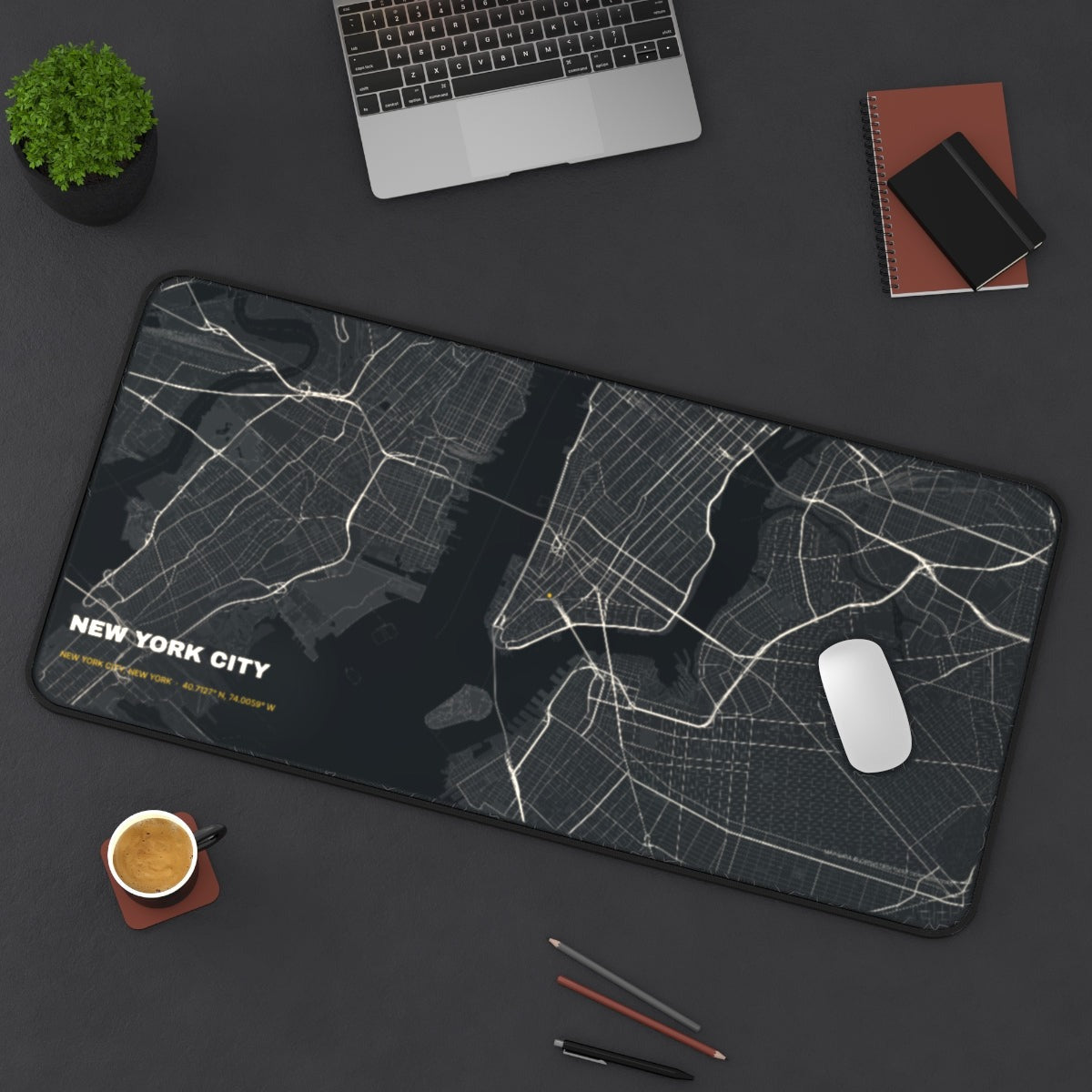 New York City Street Map desk mat on a desk with a laptop, mouse and coffee cup for scale