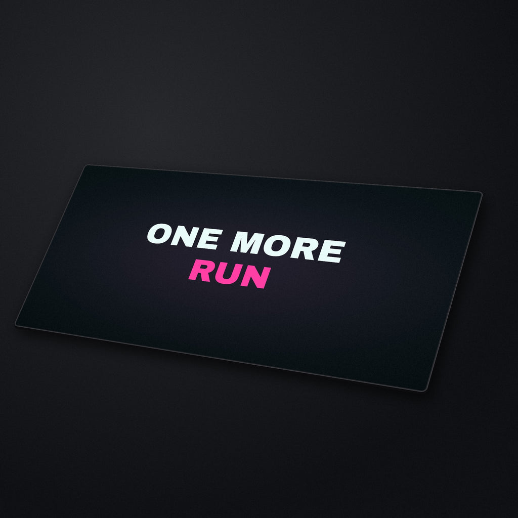 One More Run Desk Mat at an angle on a stone desk