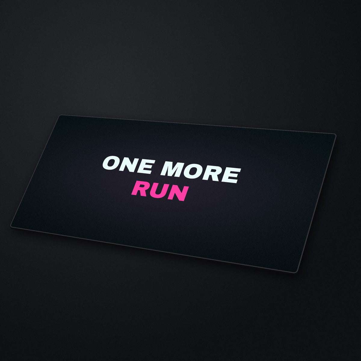 One More Run Desk Mat at an angle on a stone desk