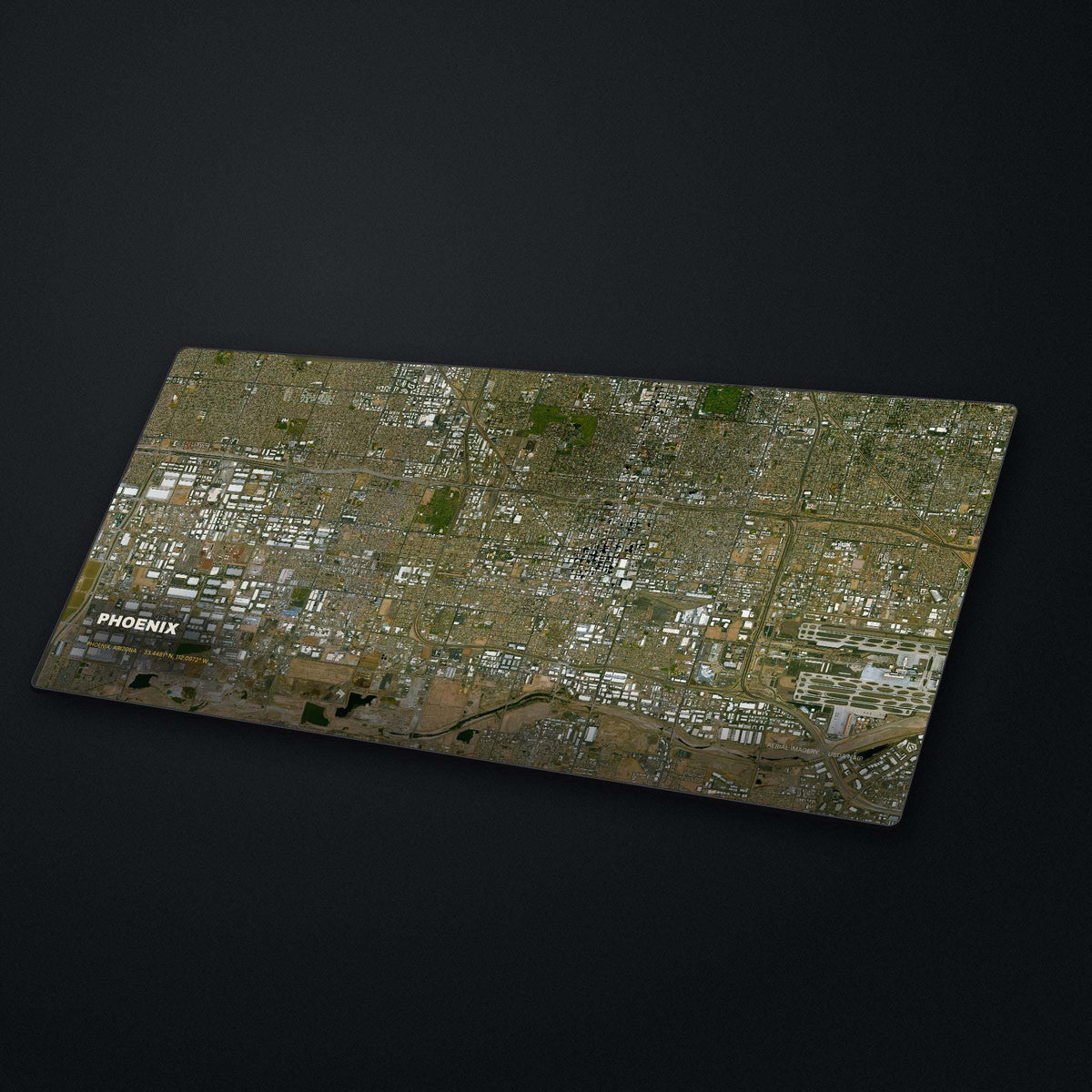 Phoenix Satellite Desk Mat at an angle on a stone desk