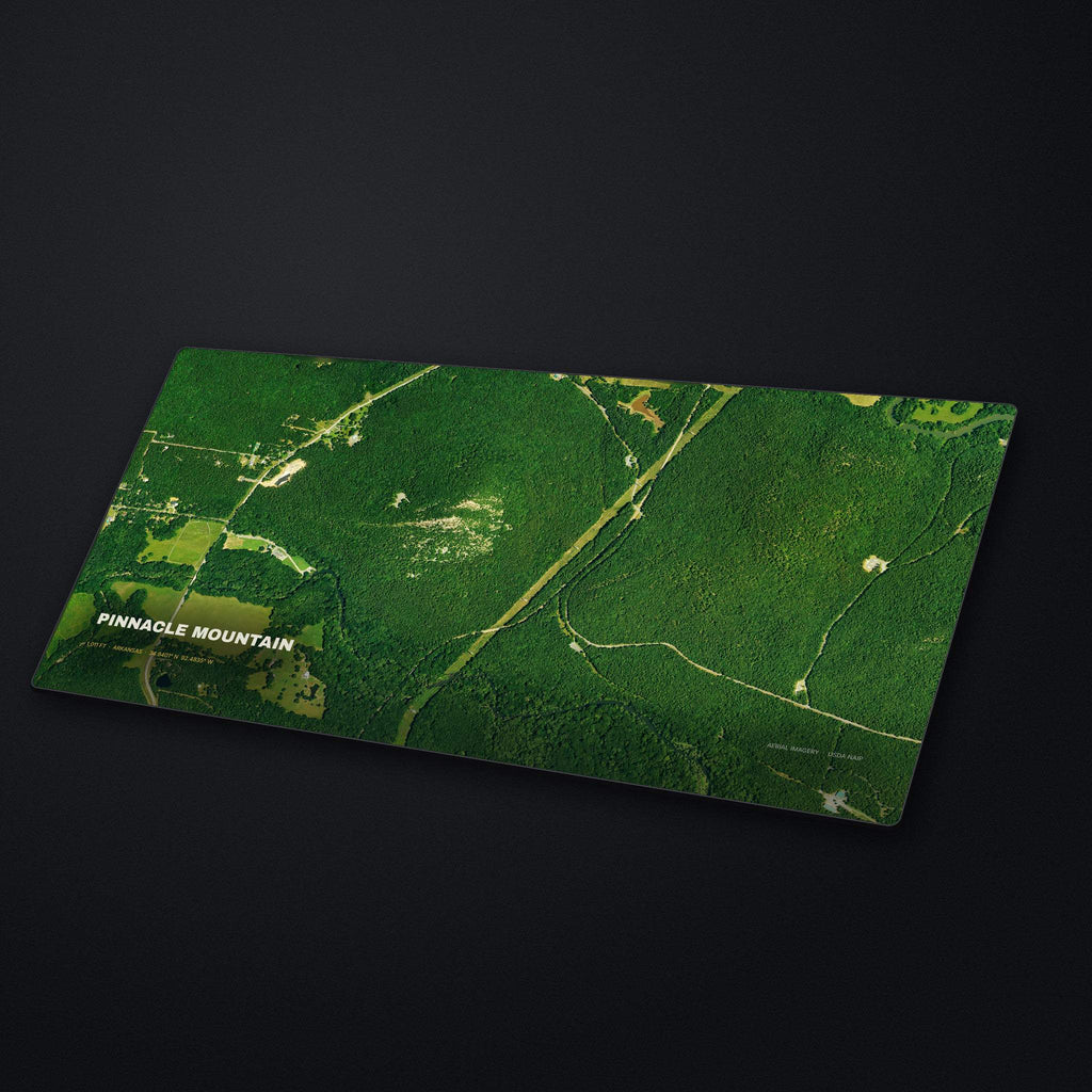 Pinnacle Mountain Satellite Desk Mat at an angle on a stone desk