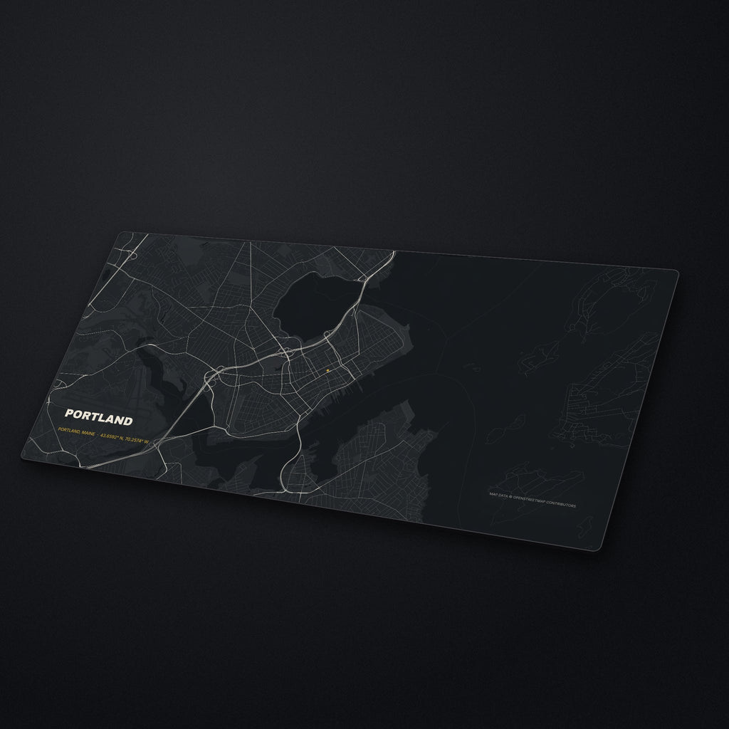 Portland Street Map Desk Mat at an angle on a stone desk